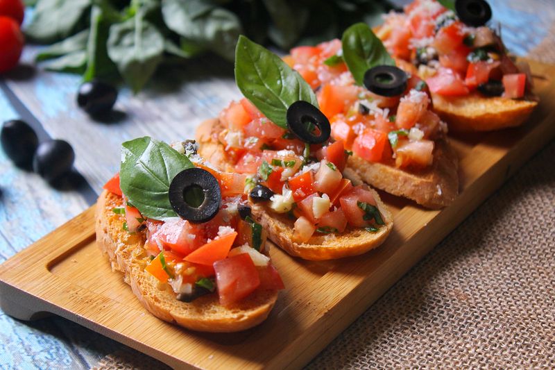 Bruschetta starter and side at Dewey's pizza
